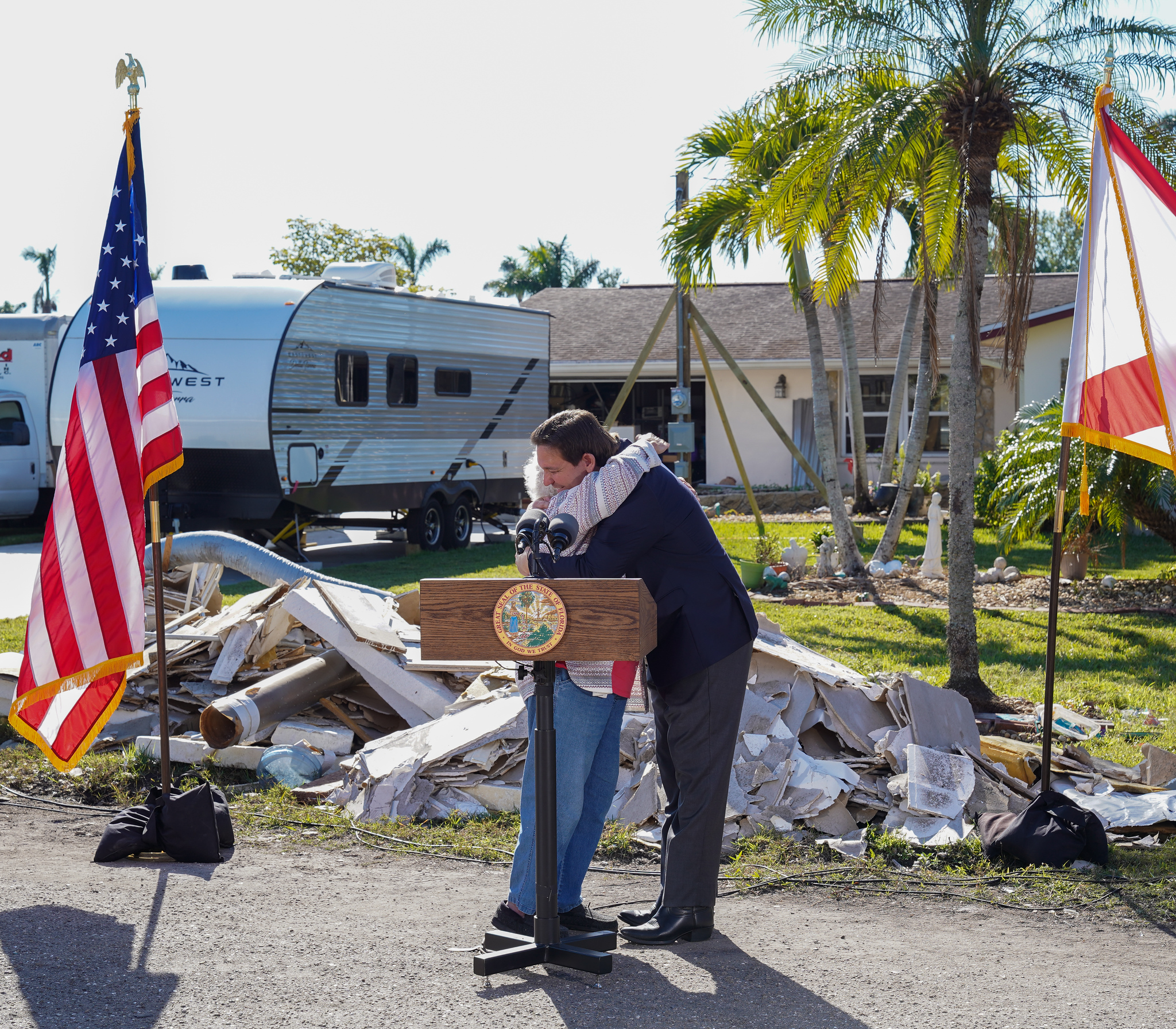 Governor DeSantis hugging a woman